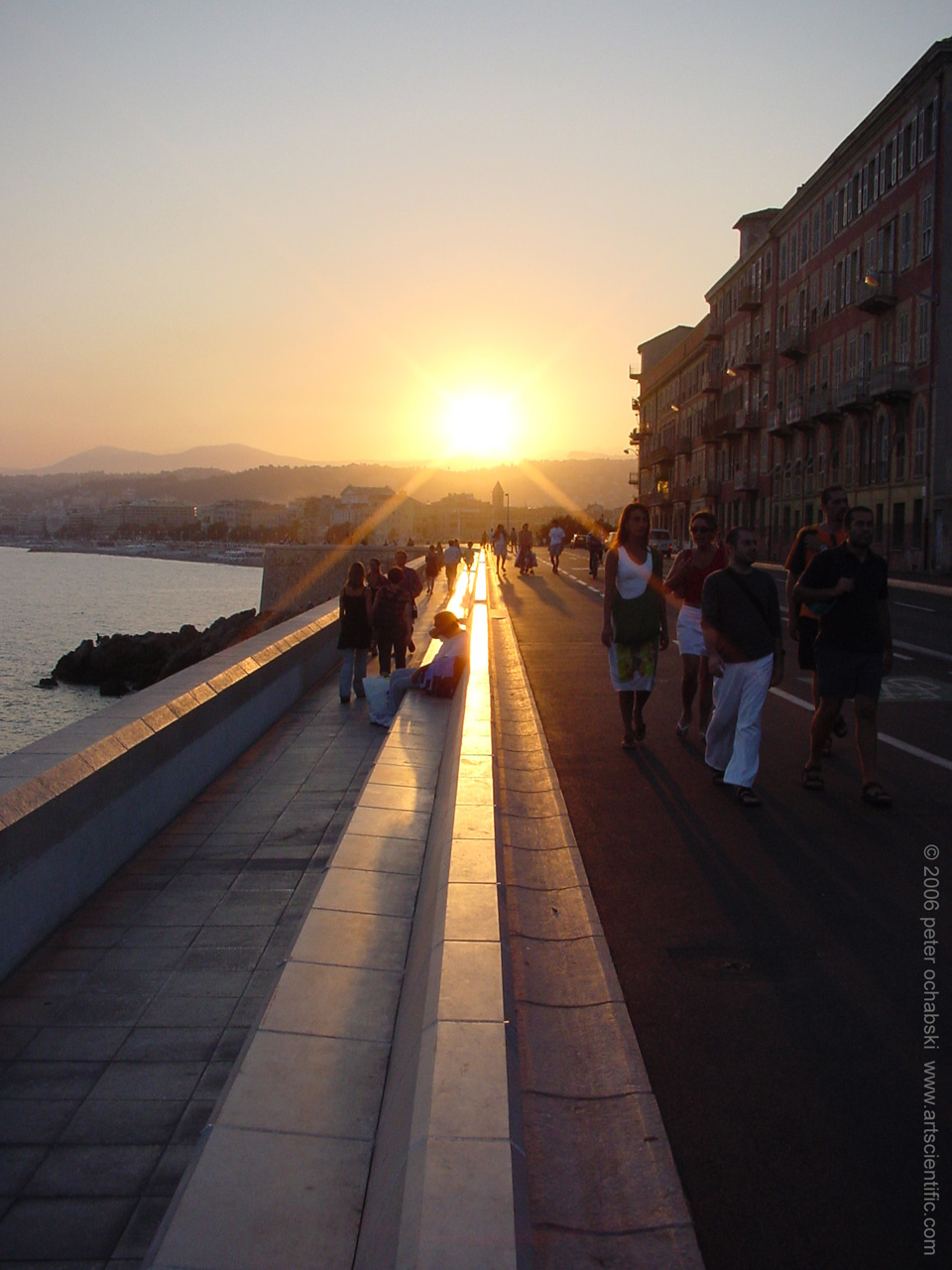 coast sunset on Nice sidewalk