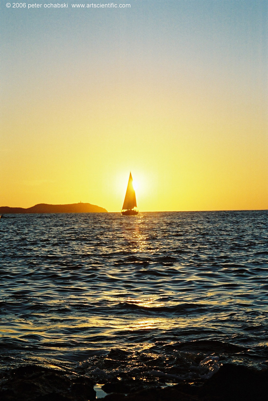 ibiza blue water sunset boat